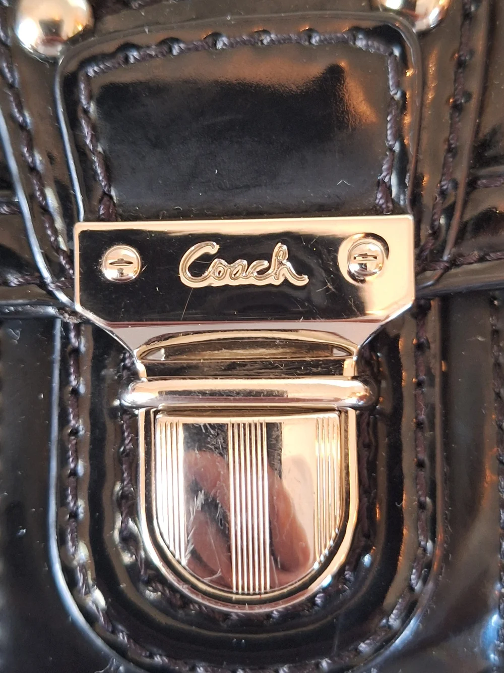 Coach sleek black